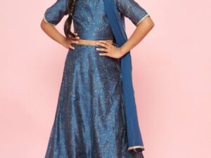 This beautiful blue lehenga choli set is perfect for young girls looking to make a statement at any