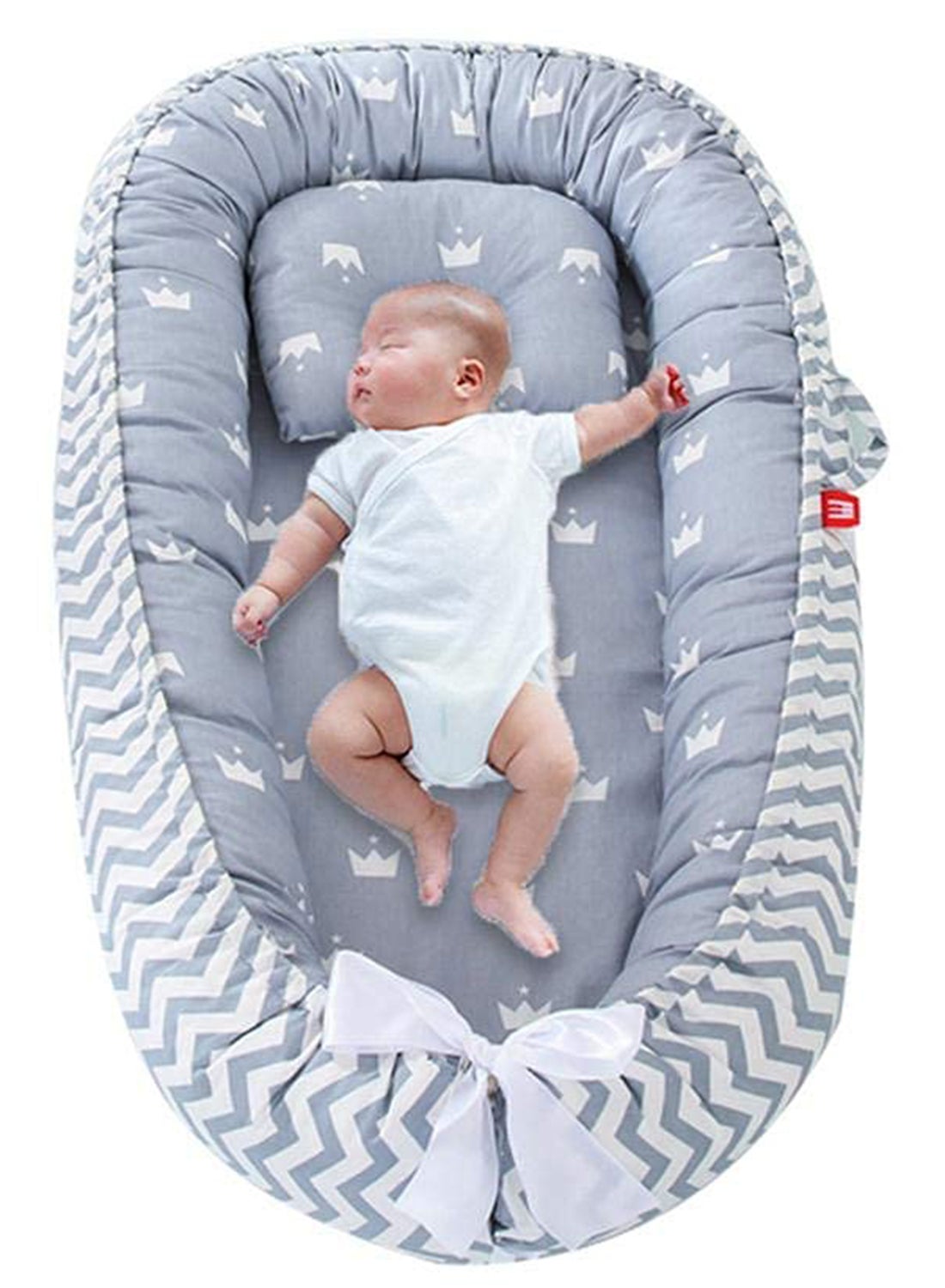 The cozy portable baby nest bed offers a comfy spot that lets the baby rest, lounge, play, cuddle, - Image 2